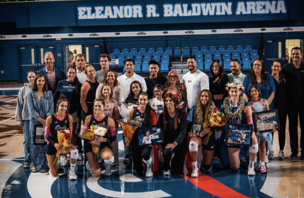 Florida Atlantic’s women's volleyball teams five seniors and their families with the volleyball team’s coaching staff